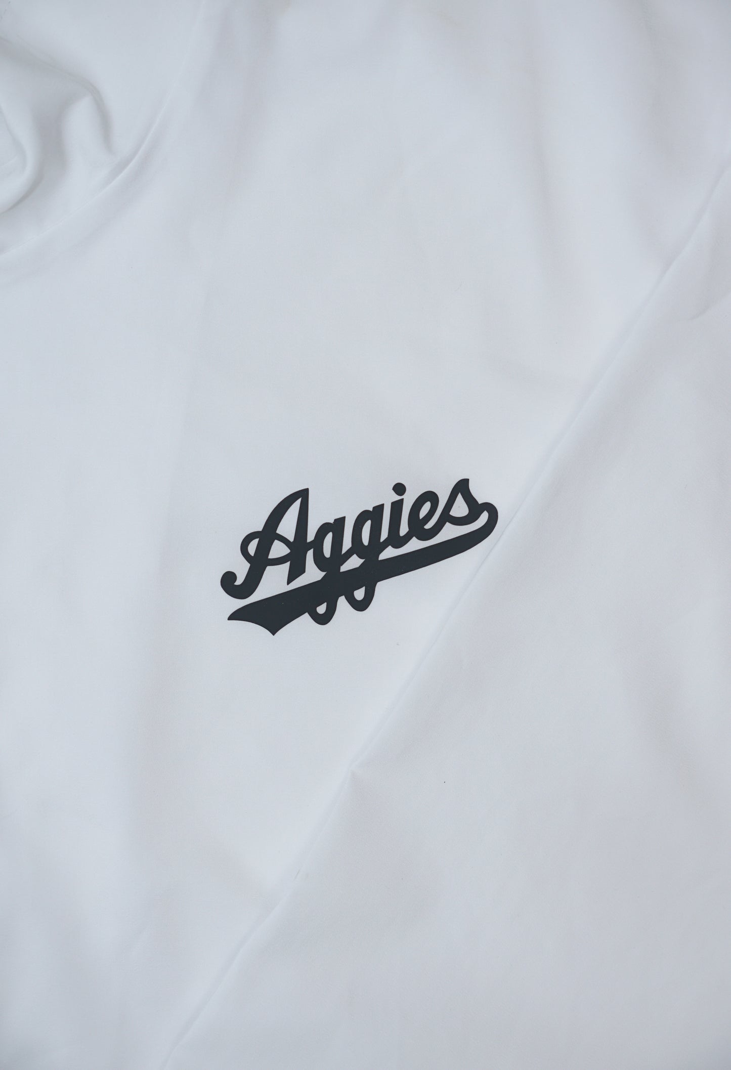 Aggie Football Coaches Exclusive White Aggie Script Windbreaker